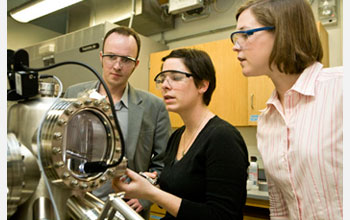 Tufts University assistant professor Charles Sykes and two graduate students, Erin Iski and April Jewell, use a scanning tunneling microscope (STM) in their lab at Tufts University.

Credit: Joanie Tobin/Tufts University Photography
