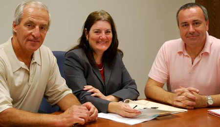 Natcore Technology, which is using Rice-born research to revolutionize the manufacture of solar panels, signed a deal with the university last week to provide $100,000 to help the lab of Rice professor Andrew Barron advance the technology. At the signing were, from left, Charles Provini, Natcore's president and CEO; Sarah White, director of Rice's Office of Sponsored Research; and Barron, the Charles W. Duncan Jr.-Welch Professor of Chemistry and professor of materials science.