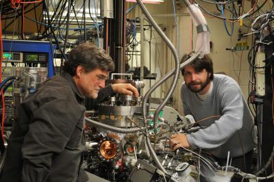 University of Utah chemistry Prof. Scott Anderson and doctoral student Bill Kaden work on the elaborate apparatus they use to produce and study catalysts, which are substances that speed chemical reactions without being consumed. The world economy depends on catalysts, and the Utah research is aimed at making cheaper, more efficient catalysts, which could improve energy production and reduce emissions of Earth-warming gases.

Photo Credit: William Kunkel
