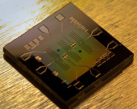 Image of chip containing the superconducting integrated circuit used to generate NOON microwave states. Credit: Erik Lucero, UCSB