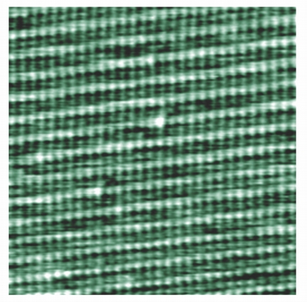 Tapping/AC mode image of calcite in water, 15nm scan, 1 height scale.  The point defects remained visible through several images, demonstrating Cyphers true atomic resolution. 