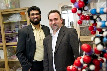 Samir Iqbal (left) electrical engineering assistant professor, and Shawn Christensen, assistant professor in biology, work on a collaborative project that more accurately detects certain types of cancer.