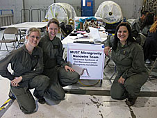 Hannah Clevenson, Olivia Lenz and Tanya Miracle flew an experiment investigating the microwave synthesis of zinc oxide nanowires under microgravity conditions on a NASA reduced-gravity flight. Image Credit: NASA 