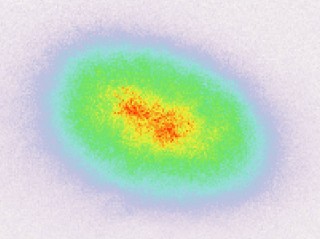 (Xibo Zhang and Cheng Chin)

This false color image shows the average density of cesium atoms taken during multiple experimental cycles for studying quantum criticality in the ultracold laboratory of Cheng Chin, associate professor in physics at UChicago. The density is lowest in the white area on the outside, highest toward the center, where higher numbers of atoms are blocking the incoming infrared laser light. Xibo Zhang collected these data in connection with his recently completed doctoral research at UChicago. 