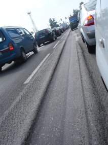 Ruts like these pose a serious threat to motorists. Zhanping You and his team have discovered that adding nanoclay to the asphalt pavement mix may help roads resist rutting.