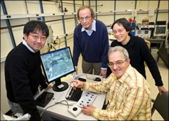 (From left) Brookhaven National Laboratory chemists Kotaro Sasaki, Radoslav Adzic, Jia Wang, and Miomir Vukmirovic work on the recently licensed electrocatalysts using a new electron microscope in their laboratory.