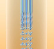 This illustration shows how a molten fiber, because of a phenomenon known as Rayleigh instability, naturally breaks up into spherical droplets. Researchers from MIT and UCF have figured out how to use this natural tendency as a way to make large quantities of perfectly uniform particles, which can have quite complex structures.
Image: Yan Liang/Fink Lab