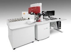 The TESCAN Integrated Minerals Analyzer (TIMA) with new automated sample loader.