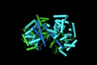 In this rendering of the SecA nanomotor, the two pistons (coloured cyan and light green) await the arrival of a protein. Cylinders, arrows and loops make up the nanomotors mechanical parts.  T. Economou 