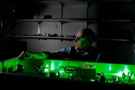 Prof. Siwick tweaking up the laser in his McGill University lab. CREDIT: Allen McInnis for McGill University