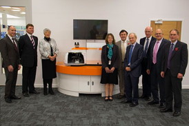 Her Majesty's Lord-Lieutenant of Gloucestershire, Dame Janet Trotter, with Renishaw Chairman and Chief Executive, Sir David McMurtry, and the Director and General Manager of the Spectroscopy Products Division, Simon Holden.