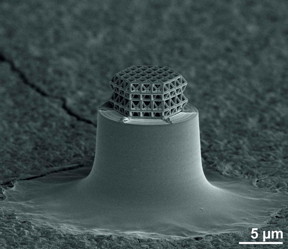 The smallest lattice in the world is visible under the microscope only. Struts and braces are 0.2 m in diameter. Total size of the lattice is about 10 m.

Photo: J. Bauer / KIT