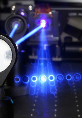 Long-exposure photo of laser beams with a twisted wavefront. The beams have holes in the middle due to destructive interference at the center of the twists.

Copyright: Faculty of Physics, University of Vienna
