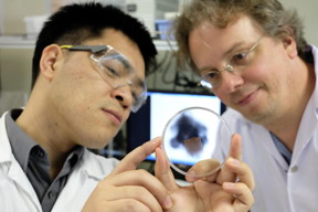 Asst. Prof. Xu Chenjie (left) and Assoc. Prof. Claus-Dieter Ohl (right) are looking at the magnetic bubbles on a petridish.
CREDIT: NTU Singapore