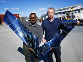 Polymer solar cells manufactured using low-cost roll-to-roll printing technology, demonstrated here by professors Olle Ingans (right) and Shimelis Admassie.
CREDIT: Stefan Jerrevng/Linkoping university