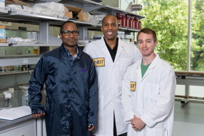 Researchers have shown that silicon dioxide nanoparticles coated with a high dielectric constant polymer might inexpensively provide improved cooling for electronic devices. Shown (l-r) are Professor James Hammonds from Howard University, Associate Professor Baratunde Cola from Georgia Tech, and Georgia Tech Graduate Student Eric Tervo.

Credit: Rob Felt, Georgia Tech