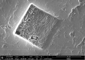 A focused ion beam microscope image shows 3-D graphene layers welded together in a block. The material is biocompatible and its material properties meet the standards necessary for consideration as a bone implant, according to researchers at Rice University. Credit: Ajayan Group/Rice University