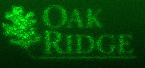 To direct-write the logo of the Department of Energys Oak Ridge National Laboratory, scientists started with a gray-scale image. They used the electron beam of an aberration-corrected scanning transmission electron microscope to induce palladium from a solution to deposit as nanocrystals. Image credit: Oak Ridge National Laboratory, U.S. Dept. of Energy