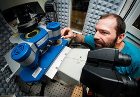 Dr Nic Mullin adjusts a sample on the JPK NanoWizard 3 AFM system at the University of Sheffield