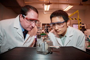 UConn Assistant Professor Michael Pettes, left, and Ph.D. student Wei Wu check a device they created to exert strain on a semiconductor material only six atoms thick, on April 18, 2018. The project proved conclusively that the properties of atomically thin materials can be mechanically manipulated to enhance their performance. The findings could lead to faster computer processors and better optical sensors.
CREDIT
Peter Morenus/UConn Photo