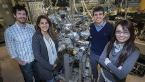 A research team led by Berkeley Lab's Alessandra Lanzara (second from left) used a SARPES (spin- and angle-resolved photoemission spectroscopy) detector to uncover a distinct pattern of electron spins within high-temperature cuprate superconductors. Co-lead authors are Kenneth Gotlieb (second from right) and Chiu-Yun Lin (right). The study's co-authors include Chris Jozwiak of Berkeley Lab's Advanced Light Source (left).

CREDIT
Peter DaSilva/Berkeley Lab