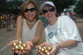 Naomi Halas (left) and Jennifer West at Houston's 2012 Art Car Parade. Rice's parade entry honored the engineering researchers for their invention of AuroLase Therapy, a cancer treatment that uses gold nanoparticles to destroy cancer without damaging health tissue. (Photo by Mike Williams/Rice University)