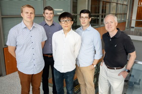 Illinois researchers developed a method to detect cancer markers called microRNA with single-molecule resolution, a technique that could be used for liquid biopsies. From left: postdoctoral researcher Taylor Canady, professor Andrew Smith, graduate student Nantao Li, postdoctoral researcher Lucas Smith and professor Brian Cunningham.

Photo by L. Brian Stauffer