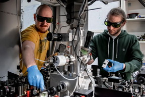 Scientists from Vienna, Kahan Dare (left) and Manuel Reisenbauer (right) working on the experiment that cooled a levitated nanoparticle to its motional quantum groundstate.

CREDIT
 Lorenzo Magrini, Yuriy Coroli/University of Vienna