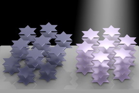 Atoms in the crystal lattice of tantalum disulfide arrange themselves into six-pointed stars that can be manipulated by light, according to Rice University researchers. The phenomenon can be used to control the material’s refractive index. It could become useful for 3D displays, virtual reality and in lidar systems for self-driving vehicles. (Credit: Weijian Li/Rice University)