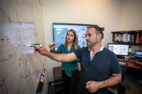 Berkeley Lab scientists Tijana Radivojevic (left) and Hector Garcia Martin working on mechanistic and statistical modeling, data visualizations, and metabolic maps at the Agile BioFoundry last year.

CREDIT
Thor Swift/Berkeley Lab