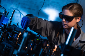Rice University graduate student Catherine Arndt helped create a potentially disruptive technology for ultraviolet optics, a solid-state “metalens” that transforms long-wave UV into focused “vacuum UV” radiation.

CREDIT
Jeff Fitlow/Rice University