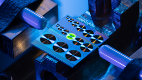 An erbium-doped waveguide amplifier on a photonic integrated chip in 1X1 cm2 size, with green emission from excited erbium ions.
CREDIT
EPFL Laboratory of Photonics and Quantum Measurements (LPQM)/Niels Ackermann.