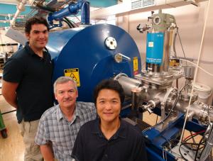 Dr Avi Shalav, Professor Rob Elliman and Tae-Hyun Kim with a high energy ion implanter