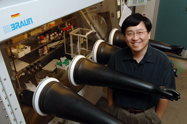 Victor Lin, an Iowa State University professor of chemistry and director of the Center for Catalysis, is leading a project that's developing a system to convert plant biomass into ethanol.  Photo by Bob Elbert.
