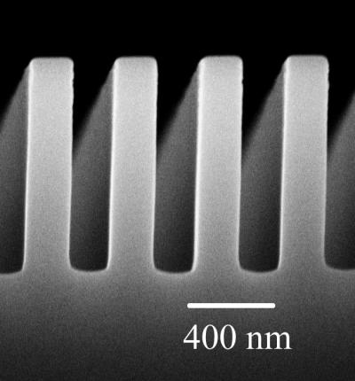 A scanning electron micrograph, taken with an electron microscope, shows the comb-like structure of a metal plate at the center of newly published University of Florida research on quantum physics. UF physicists found that corrugating the plate reduced the Casimir force, a quantum force that draws together very close objects. The discovery could prove useful as tiny microelectromechanical systems -- so-called MEMS devices that are already used in a wide array of consumer products -- become so small they are affected by quantum forces.

Yiliang Bao and Jie Zoue/University of Florida