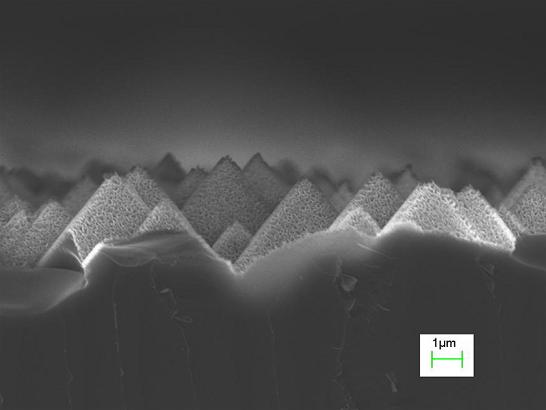 Image shows silicon pyramid structures etched for one minute using a hydrogen fluoride/hydrogen peroxide/water solution. The resulting structure has roughness at the micron and nanometer scales.