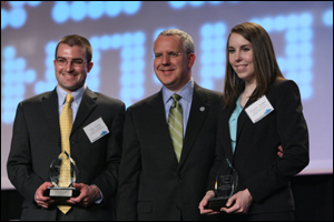 Governor Brad Henry presents Chas Craig (left) and Shannon Jarmer with the Innovation Award during the 2009 Governor's Cup Competition.