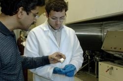  Dr. Apparao Rao and graduate student Jason Reppert assess the outcome of a nanotube synthesis procedure.  image by: Clemson University  