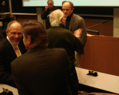 Jeff Morris (Left) and Franz Geiger (Center) talk to audience members Tuesday night after a town hall meeting on nanotechnology. Courtesy Thomas Forrest/MEDILL.