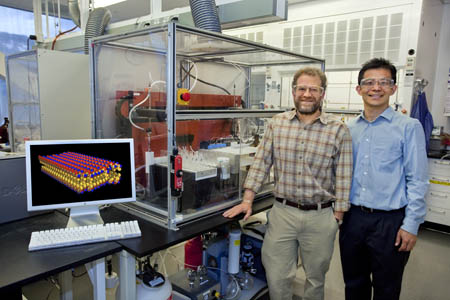 Ron Zuckermann (left) and Ki Tae Nam with Berkeley Labs Molecular Foundry, have developed a molecular paper material whose properties can be precisely tailored to control the flow of molecules, or serve as a platform for chemical and biological detection (Photo by Roy Kaltschmidt, Berkeley Lab Public Affairs).