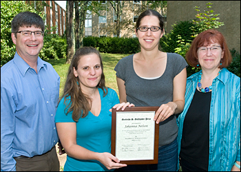 With the Goldhaber Award winner Johanna Nelson (second from left), are (from left) her advisor, Chris Jacobsen, Argonne National Laboratory and Northwestern University; Anne Sickles, a former Goldhaber Award winner who is currently an assistant scientist at Brookhaven Labs Physics Department; and Linda Bowerman, Brookhaven Women in Science.