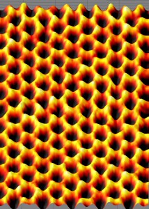 This image of a single suspended sheet of graphene taken with the TEAM 0.5, at Berkeley Labs National Center for Electron Microscopy shows individual carbon atoms (yellow) on the honeycomb lattice.