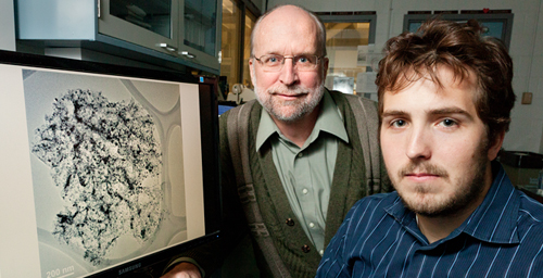 Civil and environmental engineering professor Mark Rood (left) and graduate student John Atkinson developed a novel method of producing porous carbon spheres with iron dispersed throughout them for catalytic and air quality applications. Photo by L. Brian Stauffer 