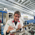 Prof. Dr. Pfleiderer prepares a sample at the Forschungs-Neutronenquelle Heinz Maier-Leibnitz
