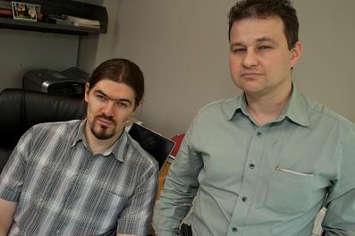 Rice graduate student Alexey Akimov, left, and Anatoly Kolomeisky, associate professor of chemistry, have taken a large step toward defining the behavior of molecules attached to a gold surface.  (Credit Jeff Fitlow/Rice University)