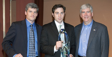 From left to right: U-M Technology Transfer mentor Nick Cucinelli, left, with first place winner Nick Moroz and Gov. Rick Snyder U-M Photo Services / Eric Bronson