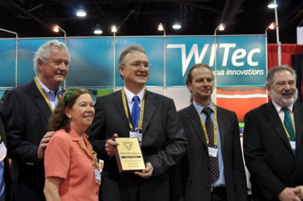 The image shows (from left to right) Dr. Robert Stevenson, Dr. Eileen Skelly Frame (Editors American Laboratory), Dr. Joachim Koenen (Managing Director WITec), Harald Fischer (Marketing Director WITec), Bob Hirche (Managing Director WITec Instruments Corp. USA)

