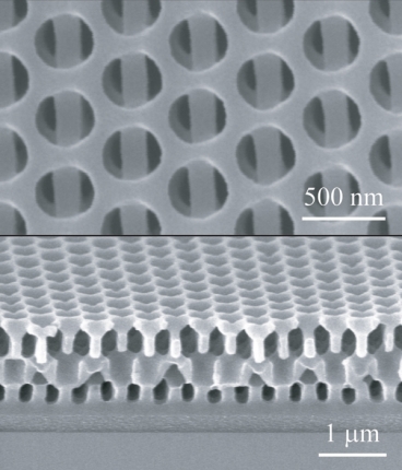 The new 3D nanofabrication method makes it possible to manufacture complex multi-layered solids all in one step. In this example, seen in these Scanning Electron Microscope images, a view from above (at top) shows alternating layers containing round holes and long bars. As seen from the side (lower image), the alternating shapes repeat through several layers.
Image: Chih-Hao Chang