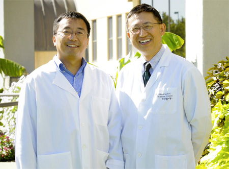 Michael Wang, MD, PhD, right, assistant professor of pathology and anatomical sciences, and Li-Qun Gu, PhD, associate professor of biological engineering, have developed a new technology for the early detection of lung cancer. Worldwide and in the United States, lung cancer is the most common cause of cancer-related death.