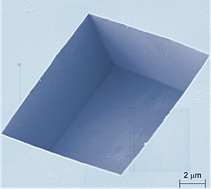 This colorized electron microscope image reveals the boxy shape of the pits the NIST team etched into the diamond surface, exhibiting their smooth vertical sidewalls and flat bottom. The pits were between 1 and 72 micrometers in size.

Credit: NIST